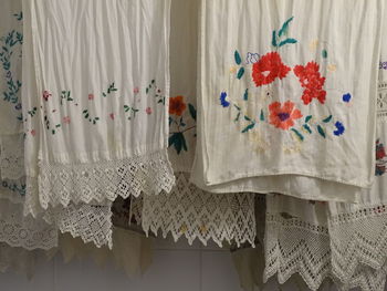 Close-up of white curtain hanging at home