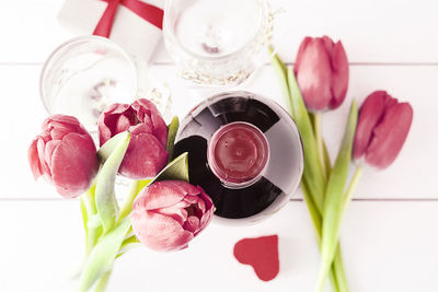 High angle view of pink roses on table