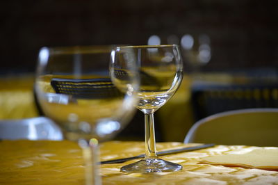 Close-up of wineglass on table