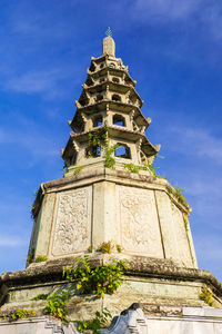 Low angle view of historic temple against sky