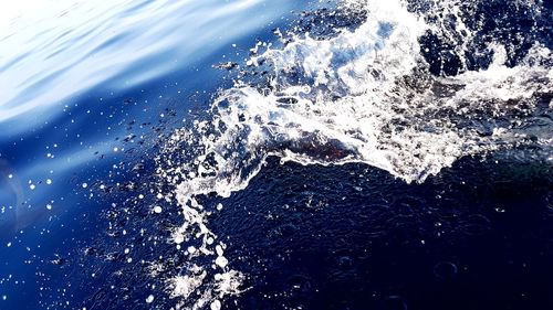 High angle view of water splashing in sea