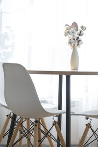 Empty chairs and tables in restaurant