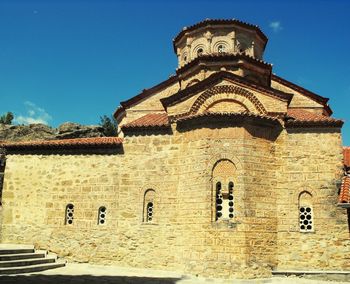 Low angle view of old building against sky