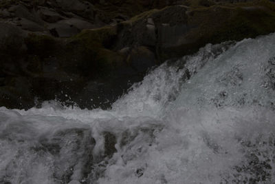 Water splashing on rocks