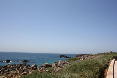 Scenic view of sea against clear sky