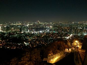 High angle shot of illuminated cityscape at night