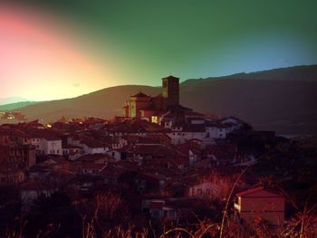 High angle view of townscape against sky at sunset