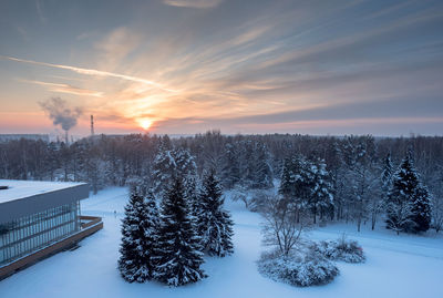 Scenic view of landscape against sky during winter