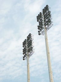 Low angle view of floodlight against sky