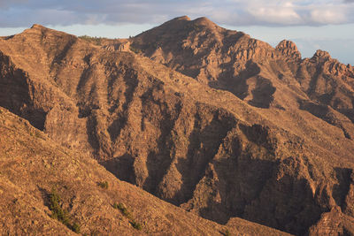 Scenic view of mountain range against sky