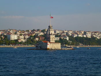 Scenic view of sea and buildings,  leandertower istanbul against sky