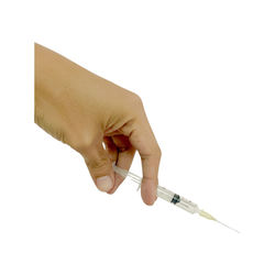 Close-up of hand holding umbrella against white background