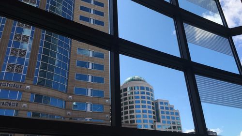 Low angle view of modern building against sky