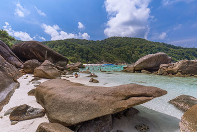 Panoramic view of sea and mountains against sky