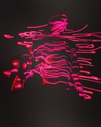 Light painting against black background