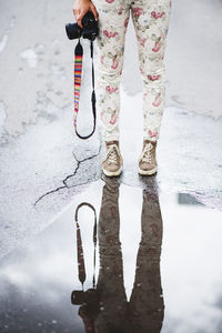 Woman's legs in floral pants