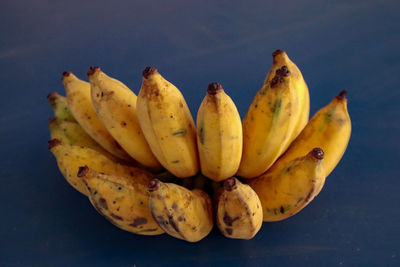 Close-up of bananas against blue background