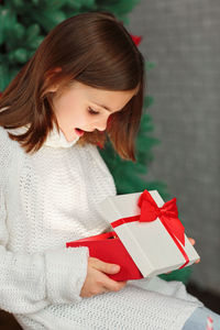 Young woman reading book