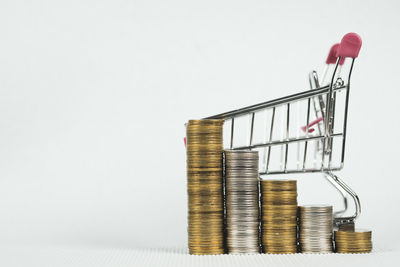 Stack of metal grate against white background