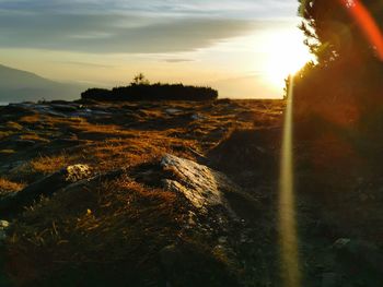 Aerial view of landscape against sky during sunset