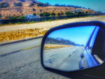 Road passing through car windshield