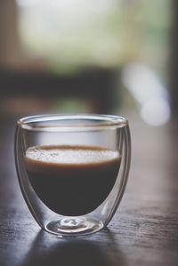 Close-up of coffee cup on table