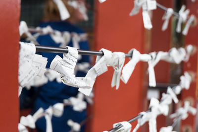 Close-up of flags hanging