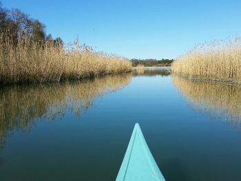 Cropped image of canoe at lake