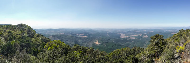 Scenic view of tree mountains against clear sky