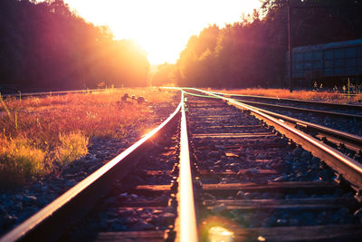 Railroad tracks during sunny day