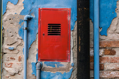 Close-up of red door