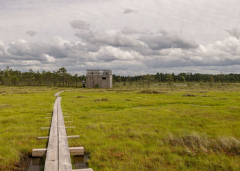 House on field against sky