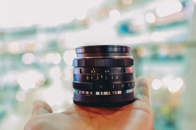 Close-up of hand holding camera