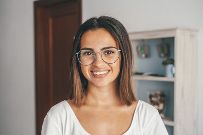 Portrait of smiling girl at home