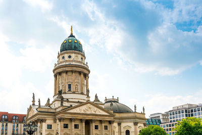 Low angle view of german church at gendarmenmarkt against sky