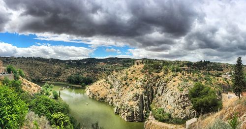 Panoramic view of river and trees against sky