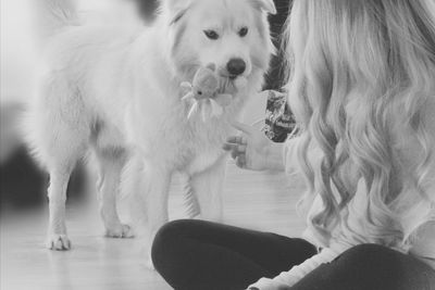 Woman with dog at home