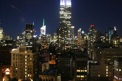 Illuminated cityscape at night