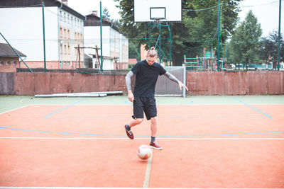 Man playing soccer