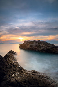 Scenic view of sea against sky during sunset