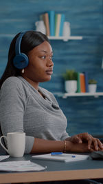 Side view of businesswoman in office