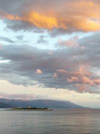 Scenic view of sea against sky at sunset