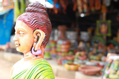 Close-up of statue against blurred background