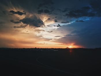 Scenic view of silhouette landscape against sky during sunset