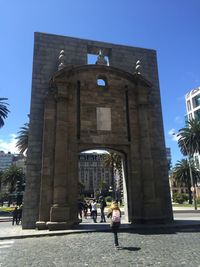 Tourists in front of historic building