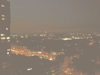 Illuminated cityscape at night