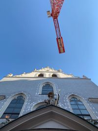 Low angle view of traditional building against clear blue sky