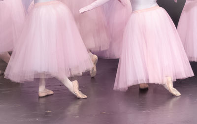 Low section of woman dancing on stage