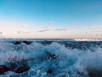 Scenic view of sea against sky during sunset