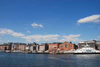 A summers day on the water around the old town area of oslo in norway